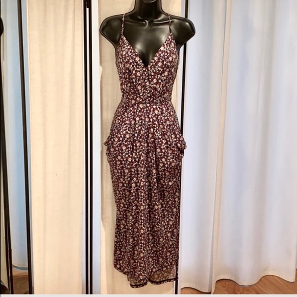 BCBGeneration Dresses & Skirts - 2/$20 BCBGeneration floral sleeveless midi dress